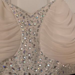 Gorgeous strapless formal with faux stone and crystals. Flowing skirt, perfect!